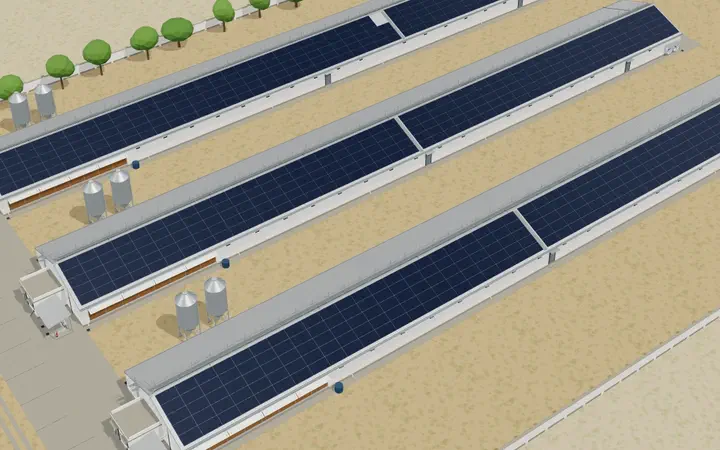 3D model of three long poultry sheds with solar modules along their roofs and feed silos between them